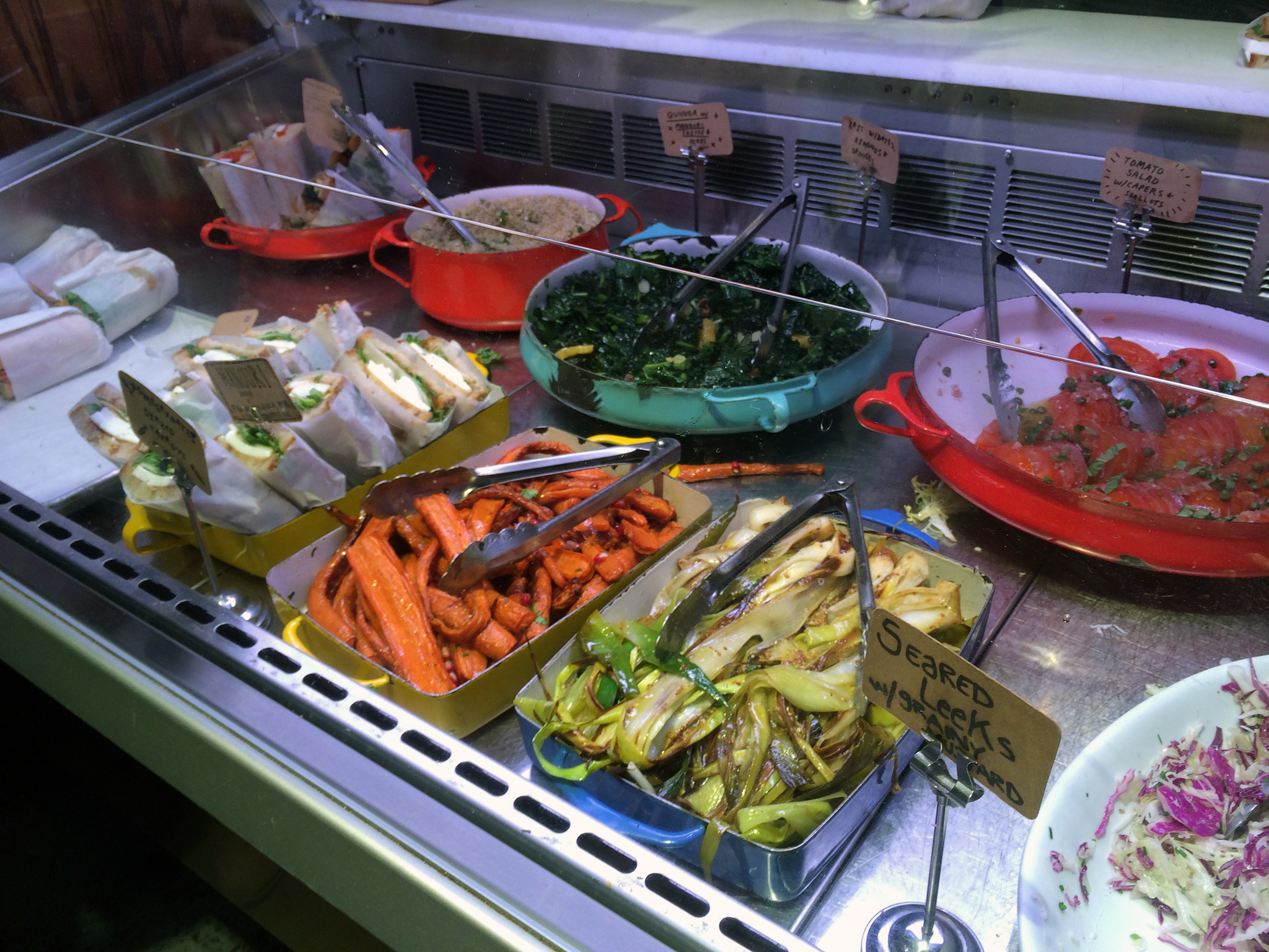 Salads and side dishes at Smile To Go in New York. Photo by alphacityguides.