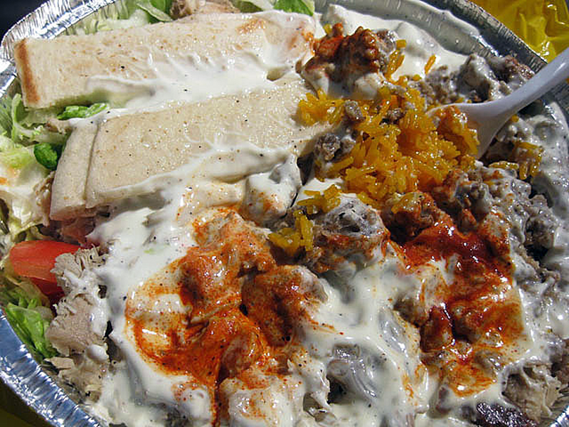 Lamb, chicken and rice at Halal Guys in New York. Photo by <a href="http://www.flickr.com/photos/mesohungry/3461573602/">jasonlam</a>