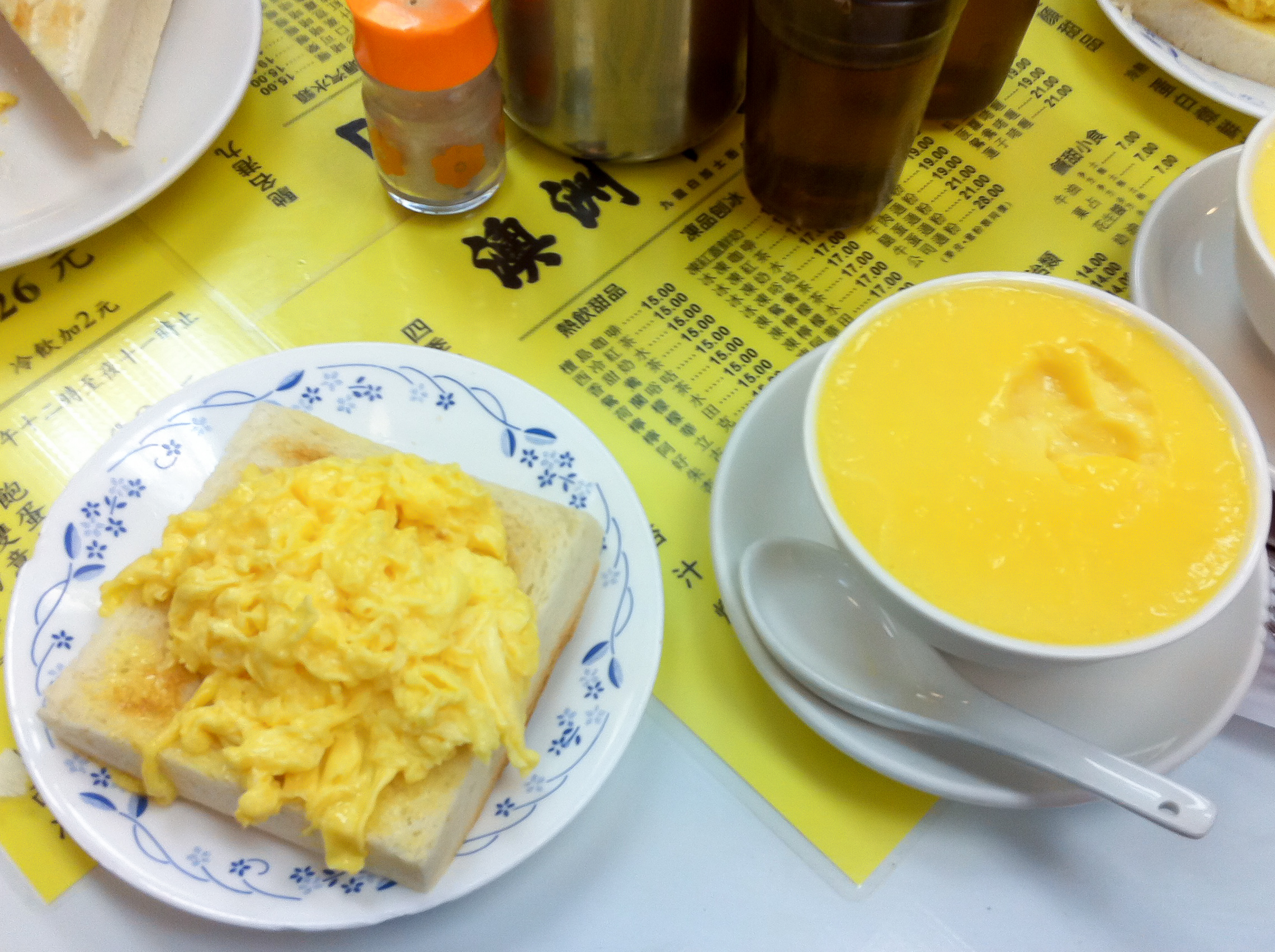 Scrambled eggs and cold custard at Australia Dairy Company in Hong Kong. Photo by alphacityguides.