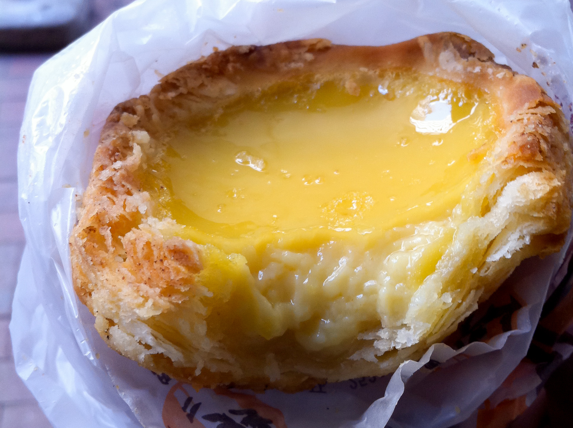 Egg tart at Honolulu Coffee Shop in Hong Kong. Photo by alphacityguides.