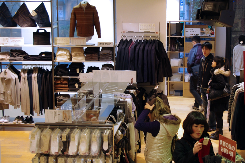 Fashion display inside Muji in Tokyo. Photo by alphacityguides.