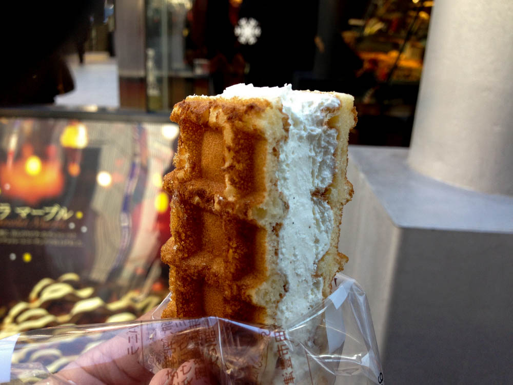 Waffle with cream at Manneken in Tokyo. Photo by alphacityguides.