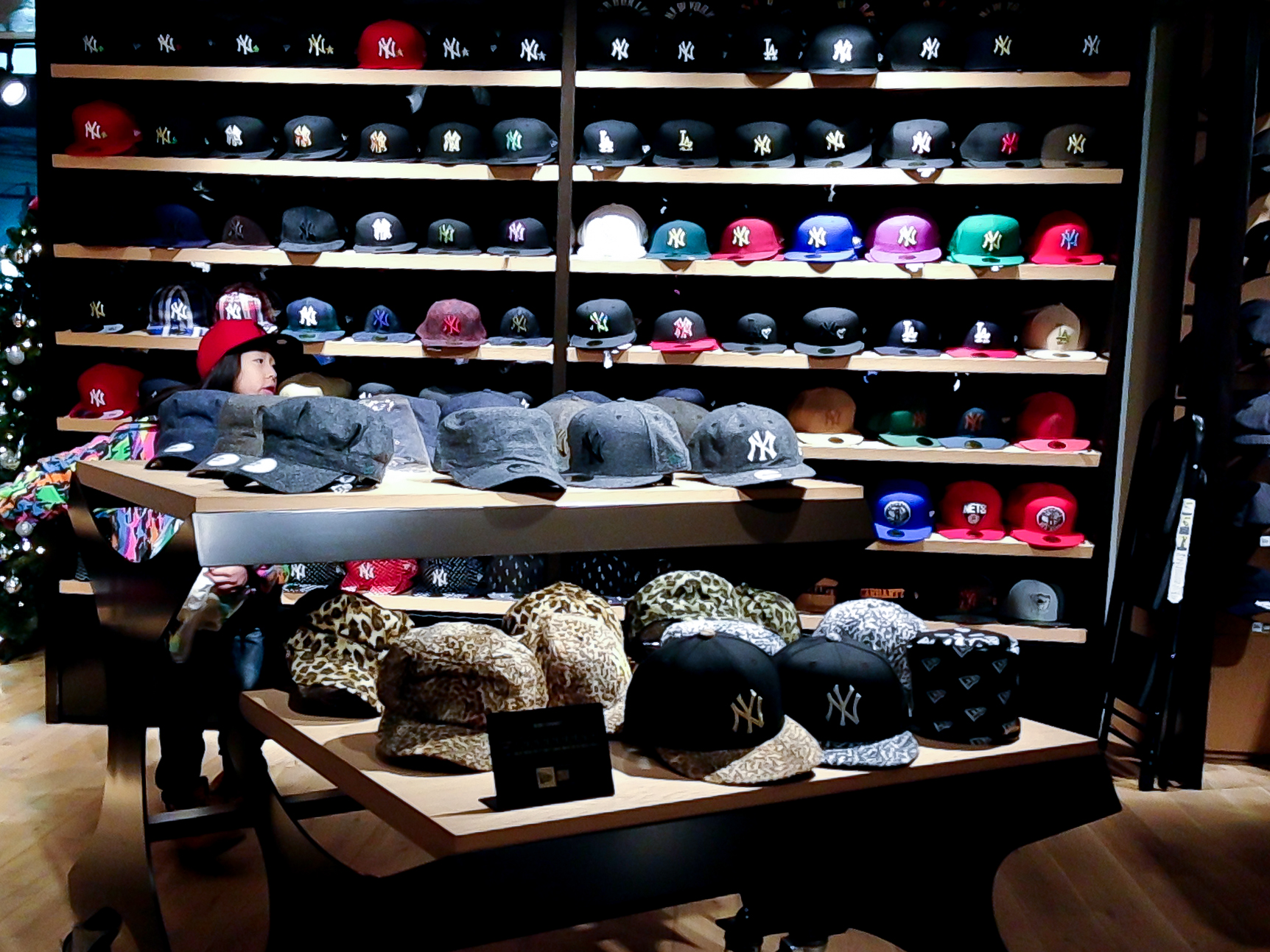 Hat wall inside New Era in Tokyo. Photo by alphacityguides.