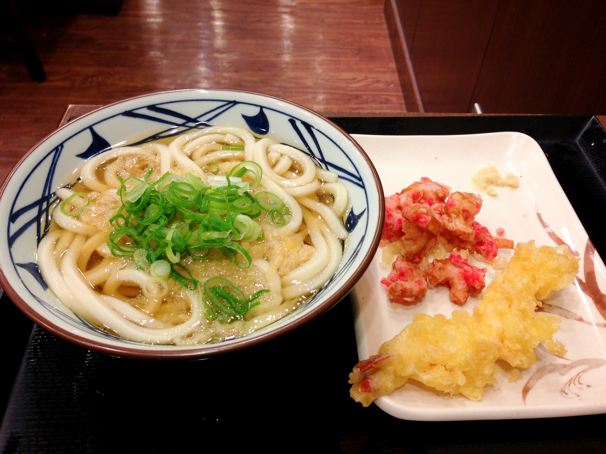Udon bowl at Muginbo in Tokyo. Photo by alphacityguides.