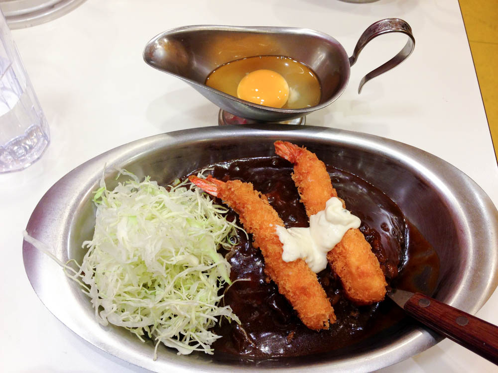 Curry and raw egg at Go Go Curry  in Tokyo. Photo by alphacityguides.
