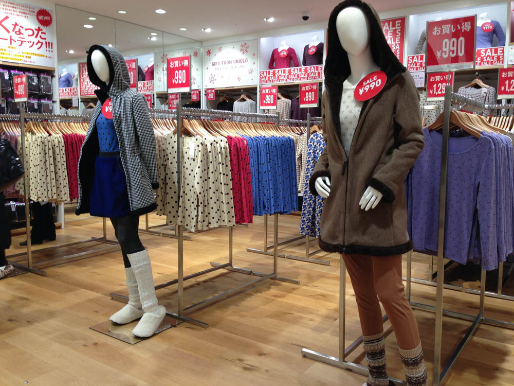 Fashion display inside Uniqlo in Tokyo. Photo by alphacityguides. 