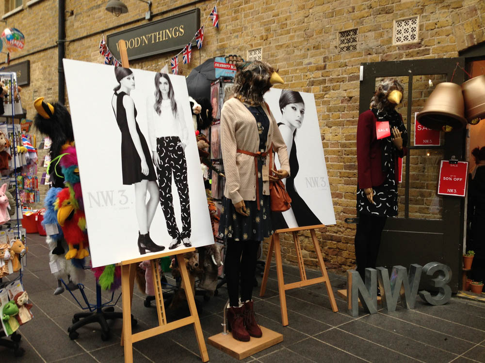 Shops at Old Spitalfields Market in London. Photo by alphacityguides.