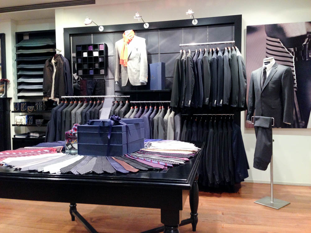 Made to measure suit display inside Scabal on Savile Row in London. Photo by alphacityguides. 
