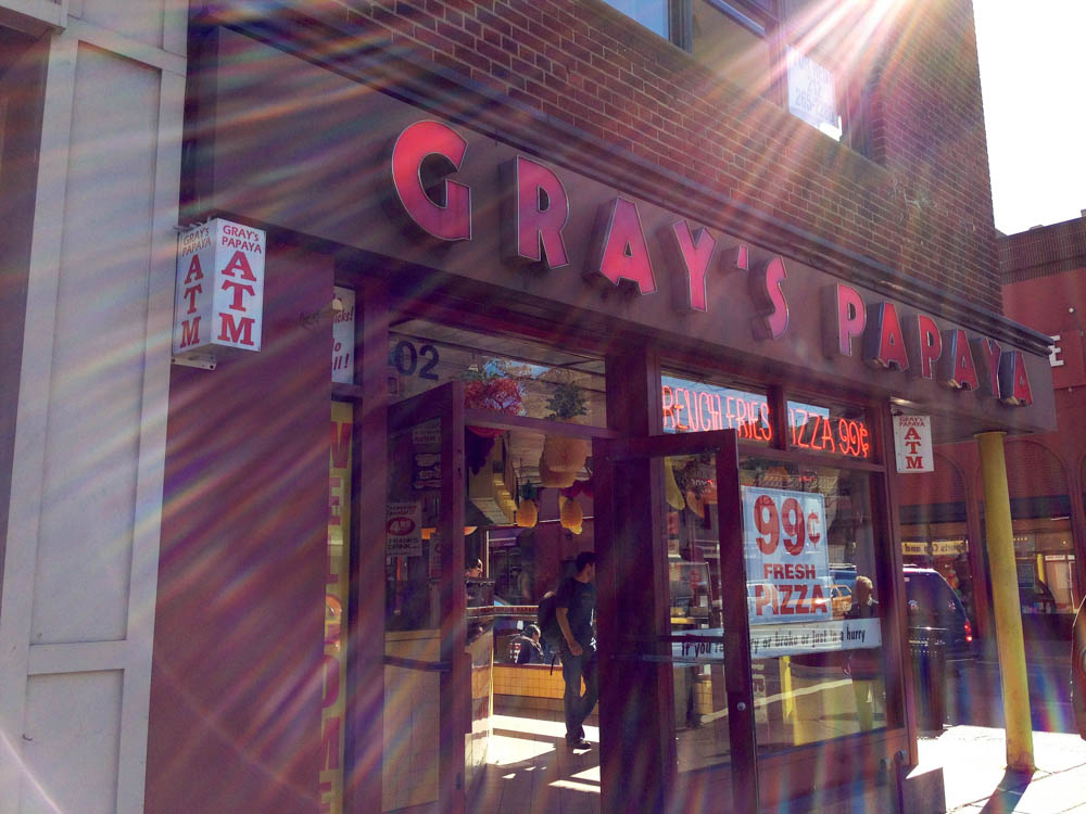 Store front at Gray's Papaya in New York. Photo by alphacityguides.