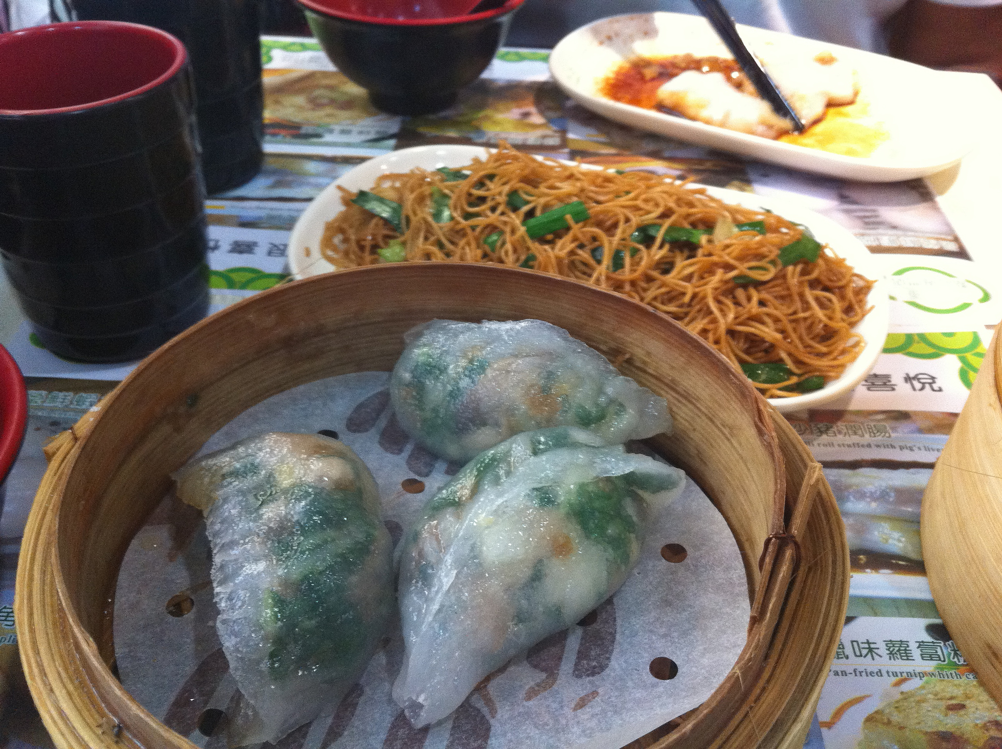 Dumplings and deep fried noodles at Tim Ho Wan in Hong Kong. Photo by alphacityguides.