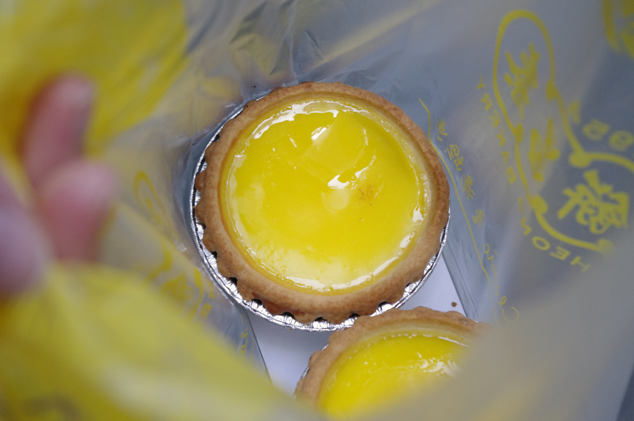 Egg tart at Tai Cheong Bakery in Hong Kong. Photo by alphacityguides.