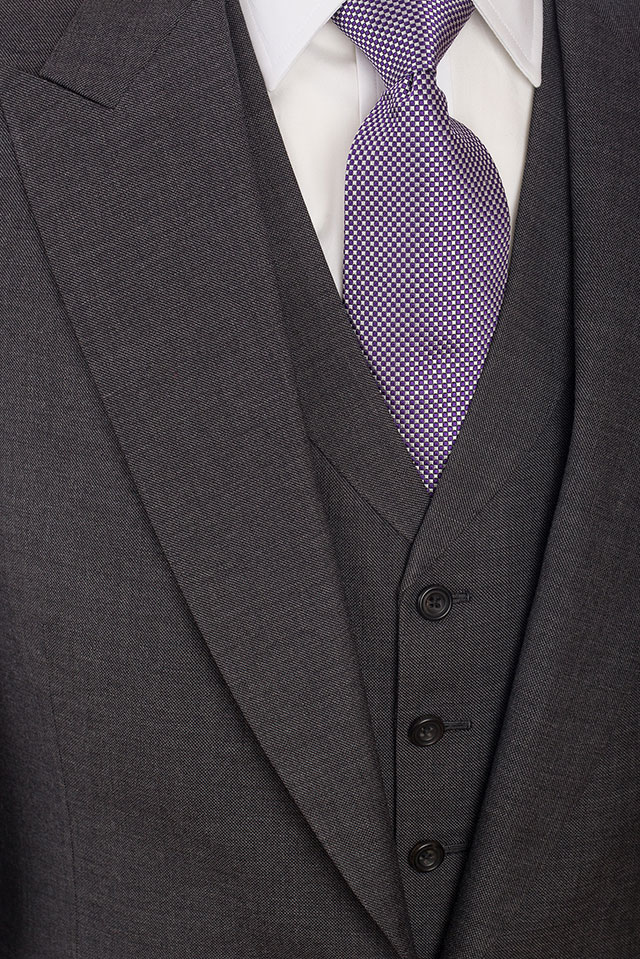 Bespoke three piece suit.