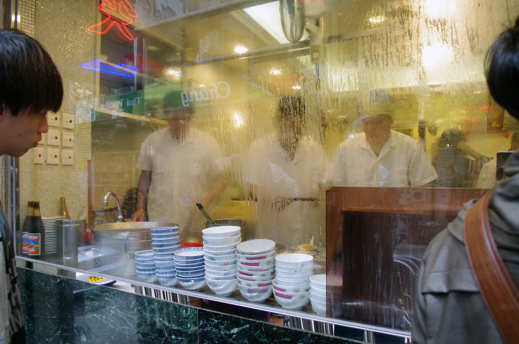 Chefs at Mak's Noodles in Hong Kong. Photo by alphacityguides.