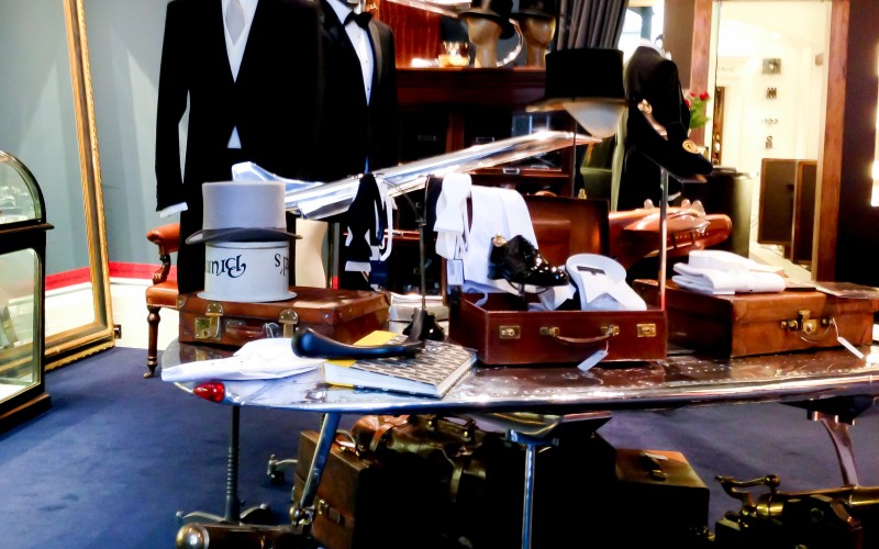Suiting and accessories inside of Gieves & Hawkes on Savile Row in London. Photo by alphacityguides.