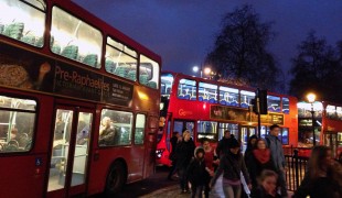 Big red double decker bus in London. Photo by alphacityguides.