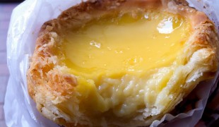 Egg tart at Honolulu Coffee Shop in Hong Kong. Photo by alphacityguides.