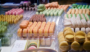 Macaron display at Pierre Hermé in Paris. Photo by alphacityguides.