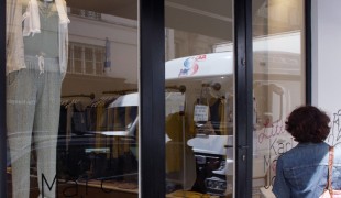 Window and store front at Karl Marc John in Paris. Photo by alphacityguides.