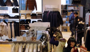 Fashion display inside Muji in Tokyo. Photo by alphacityguides.