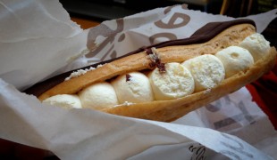 Chocolate Eclair with chantilly cream at Euporium Bakery in Covent Garden, London. Photo by alphacityguides.