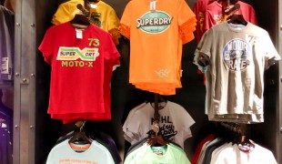 T-shirt wall at Superdry in London. Photo by alphacityguides.