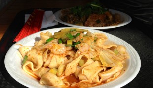 Hot & spicy oil seared handpulled noodle at Xi’an Famous Foods in New York. Photo by alphacityguides.