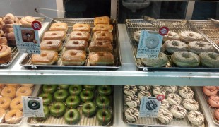 Doughnut display case at Doughnut Plant in Tokyo. Photo by alphacityguides.