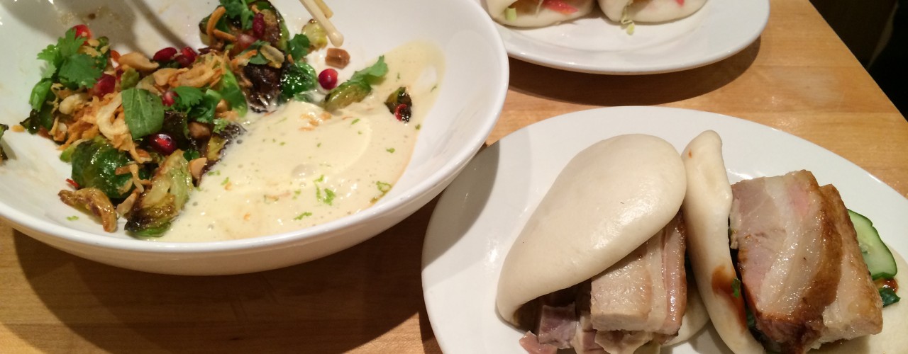 Buns and brussel sprouts at Momofuku Noodle Bar in New York. Photo by alphacityguides.