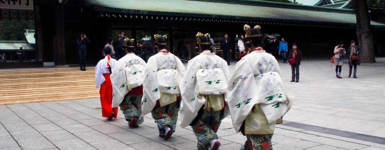 Members of a wedding procession at the Meiji Shrine in Tokyo. Photo by alphacityguides.