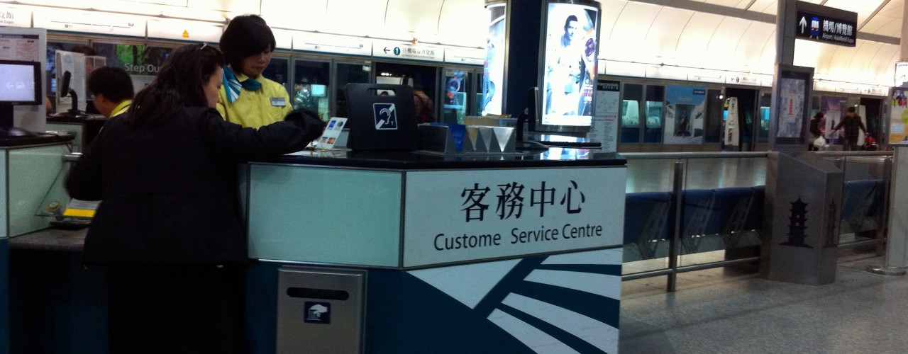 Airport Express ticket counter and platform in Hong Kong. Photo by alphacityguides.