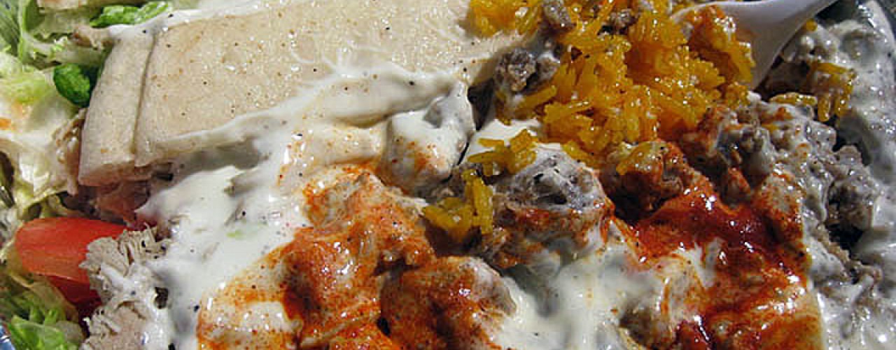 Lamb, chicken and rice at Halal Guys in New York. Photo by <a href="http://www.flickr.com/photos/mesohungry/3461573602/">jasonlam</a>