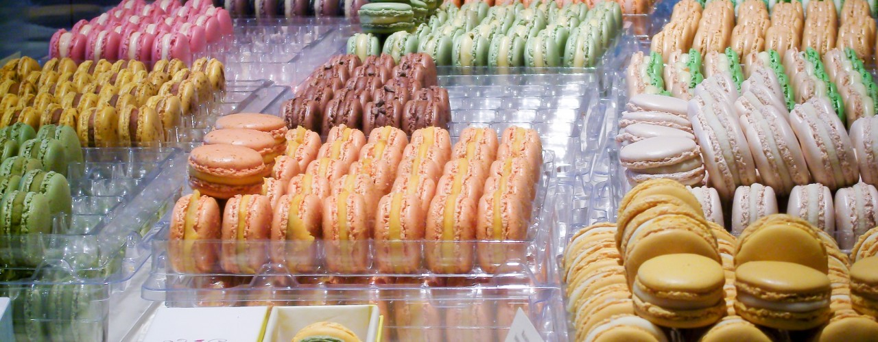 Macaron display at Pierre Hermé in Paris. Photo by alphacityguides.