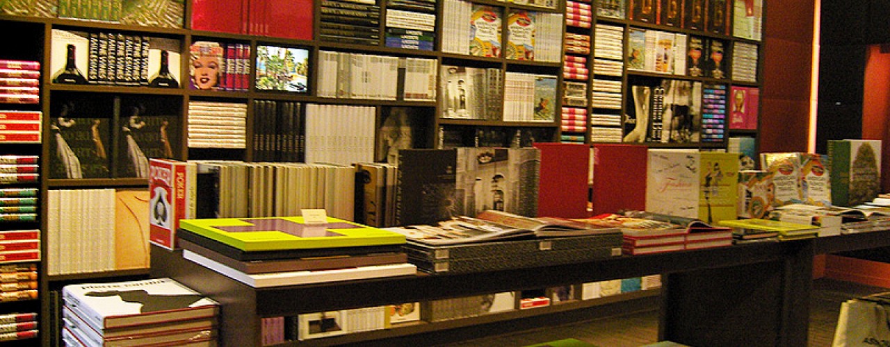 Book wall display at Assouline in Paris. Photo by alphacityguides. 