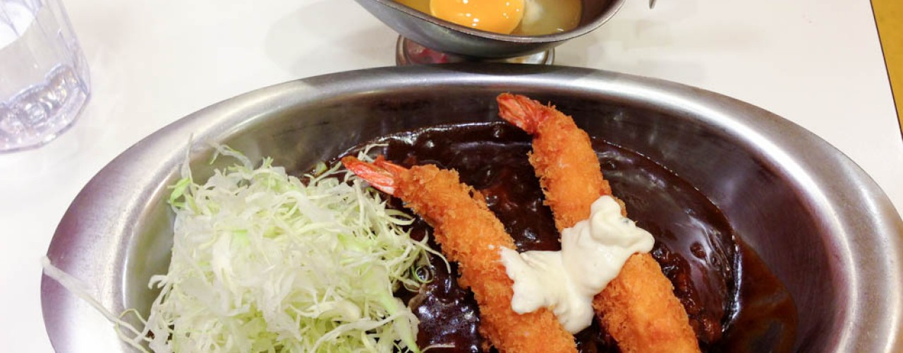 Curry and raw egg at Go Go Curry  in Tokyo. Photo by alphacityguides.