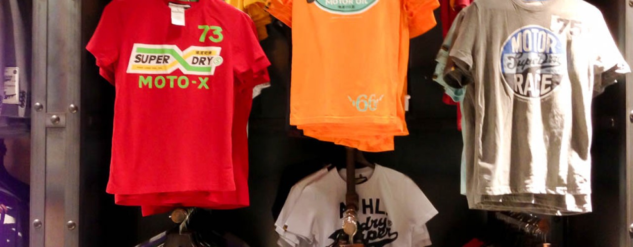 T-shirt wall at Superdry in London. Photo by alphacityguides.