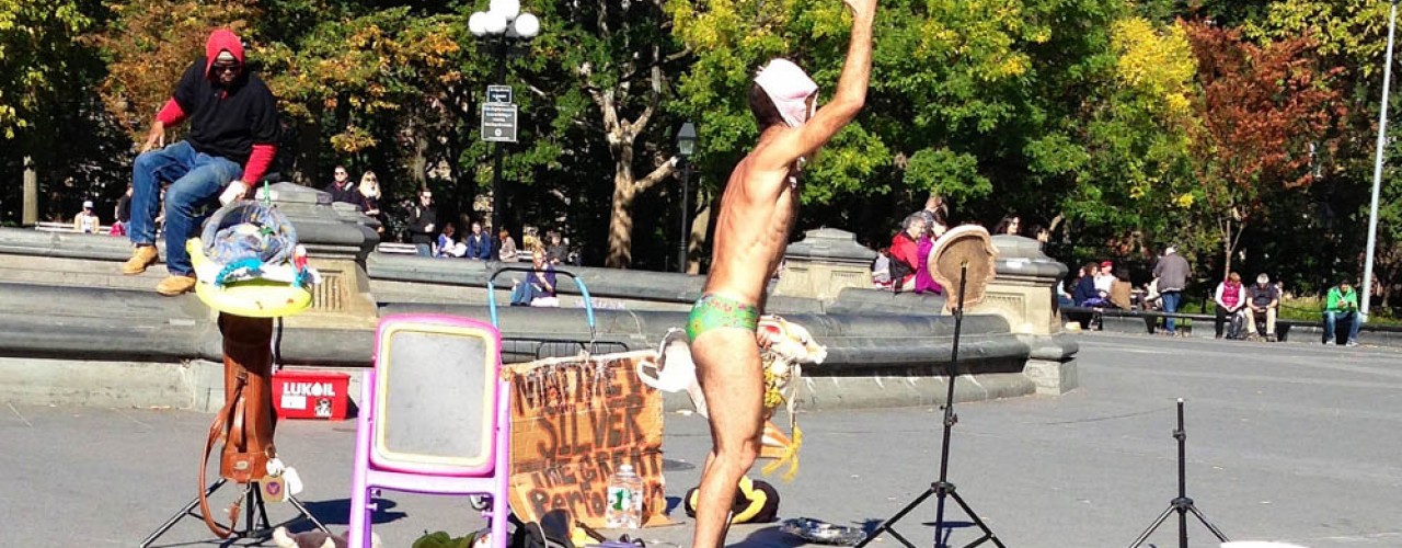 Eclectic street performer in Washington Square Park in New York. Photo by alphacityguides.