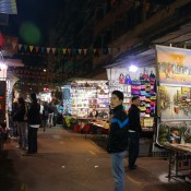 Posters and art at the Temple Street Market in Hong Kong. Photo by alphacityguides.