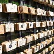 Ema prayer tables at Meiji Shrine in Tokyo. Photo by alphacityguides.