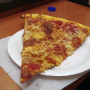 Slice at Paisano's Pizzeria & Sub Shop in Hong Kong. Photo by alphacityguides.