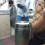 Making the milk custard at Australia Dairy Company in Hong Kong. Photo by alphacityguides.