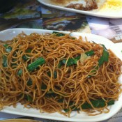 Fried noodles at Tim Ho Wan in Hong Kong. Photo by alphacityguides.