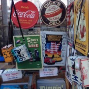 Vintage signs at Hell's Kitchen Market in New York. Photo by alphacityguides.