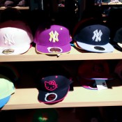 Hat wall inside New Era in Tokyo. Photo by alphacityguides.