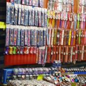 Colorful watches and accessories at the Temple Street Market in Hong Kong. Photo by alphacityguides.