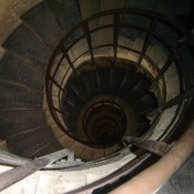 Staircase inside Arc de Triomphe in Paris. Photo by alphacityguides.