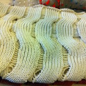 Knit sweater inside Creatures of Comfort in New York. Photo by alphacityguides.