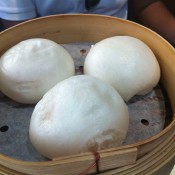 Steamed creamy custard buns at Tim Ho Wan in Hong Kong. Photo by alphacityguides.