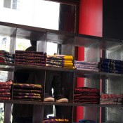 Fashion display inside Le temps des Cerises in Paris. Photo by alphacityguides. 