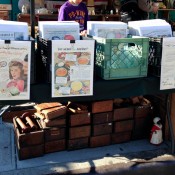 Vintage signs at Hell's Kitchen Market in New York. Photo by alphacityguides.