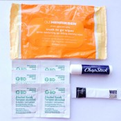 Cleansing wipes, alcohol swabs, lip balm and sugar for your face scrub.